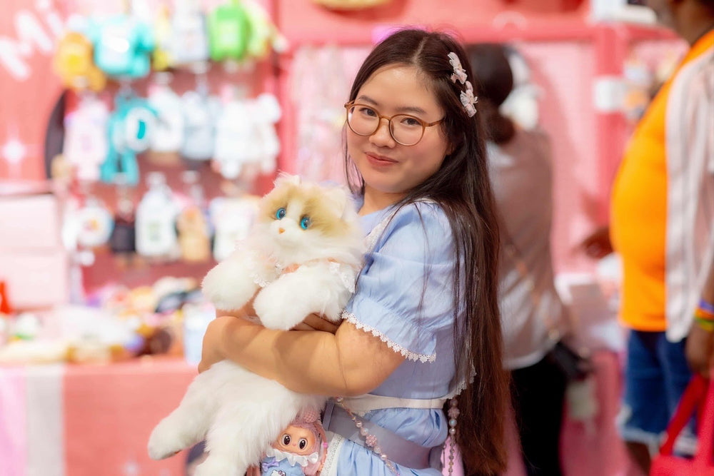 Miyo at her convention booth